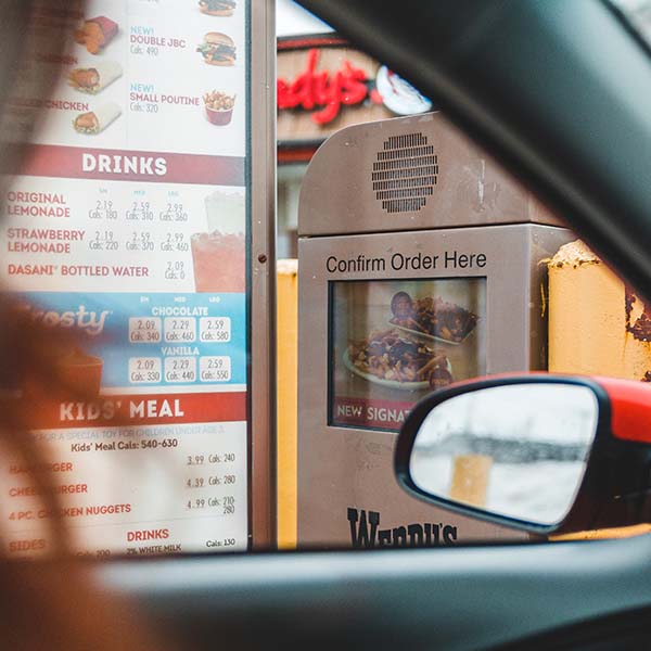 Woman at a drivethru.